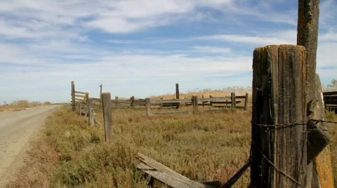 Barbed Wire Fence Pan Stock Footage 850193