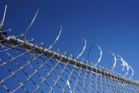 Barbed Wire Fence Stock Photos