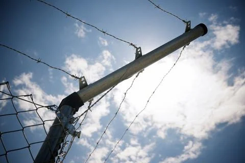 Barbed wire fence Stock Photos