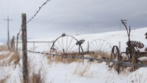 Barbed wire fence on a snow covered farm Stock Footage 113236000