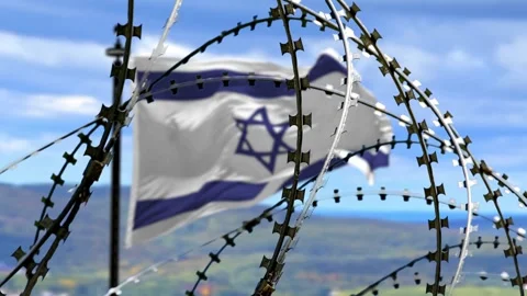 Barbed wire, flag of Israel on flagpole in defocus, sky background with clouds,  Stock Footage 255502810