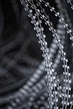 Barbed wire in grunge style process. Stock Photos
