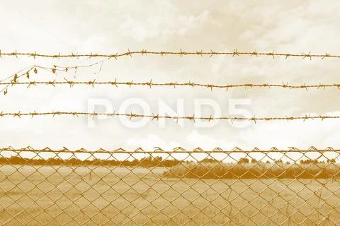 Barbed wire imprison, detention center, incarcerate, Barbed wire detention Stock Photos