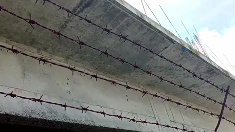 Barbed wire near the building Stock Footage 324632903