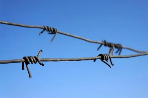 Barbed wire Stock Photos