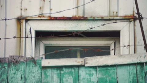 Barbed wire. Prison fence. View at the barb wall of the crime area. Stock-Footage 170457426