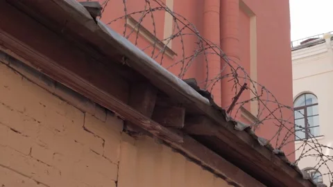 Barbed wire on prison wall. Stock Footage 157287540