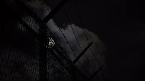 Barbed Wire Silhouette, Full Moon Timelapse Stock Footage 98052360