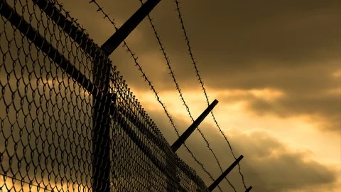 Barbed Wire Silhouette, Sunset Timelapse Stock Footage 98066029