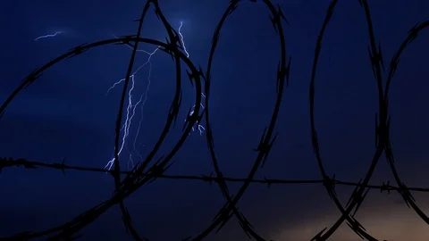 Barbed Wire Silhouette, Thunderstorm Timelapse Stock Footage 98050586