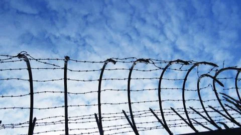 Barbed Wire with Sky Stock Photos