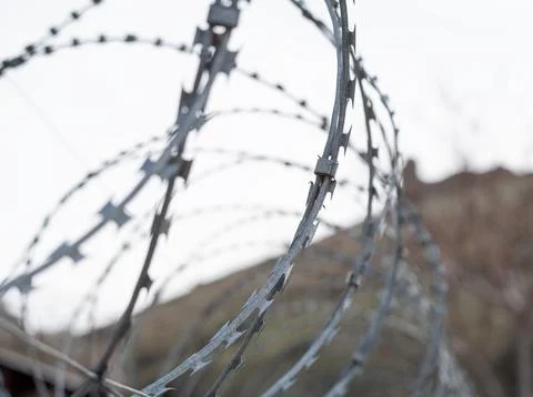 Barbed wire on white Stock Photos
