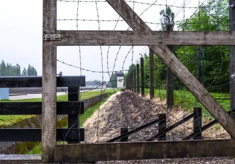 Barbed wired gate at Dachau concentration camp. Stock Photos