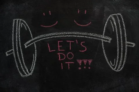 Barbell and Let's do it text on black chalkboard Stock Photos