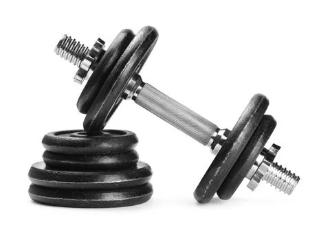 Barbell and stack of weight plates isolated on white Stock Photos