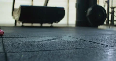 Barbell falling down after exercise. Weightlifting cinematic close up Stock Footage 130218640