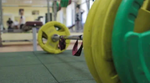 Barbell on the Floor in the Gym Stock Footage 61354933