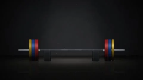 Barbell Loading with Colored Bumper Plates in Dark Gym 스톡 동영상 346879087
