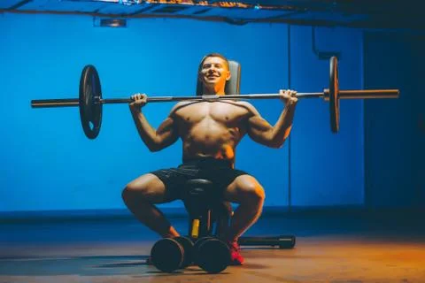 Barbell man workout Stock Photos