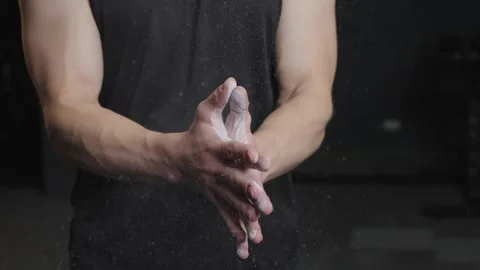Barbell training at the gym with chalk on hands and focus on lifting techniques Stock-Footage 331019317