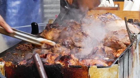 Barbeque chicken and beef being cooked Stock Footage 285166377
