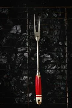Barbeque fork on charcoal Stock Photos