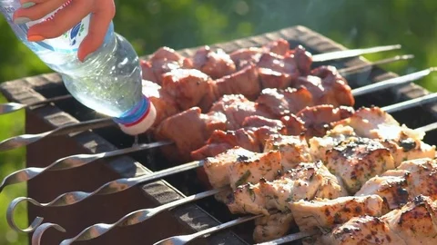 Barbeque on the grill 스톡 동영상 77553526