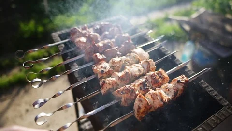 Barbeque on the grill 스톡 동영상 77556184