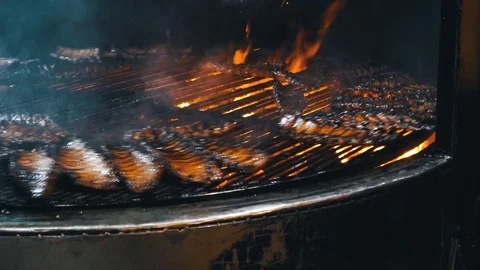 Barbeque on a grill at the restaurant Stock Footage 126787919