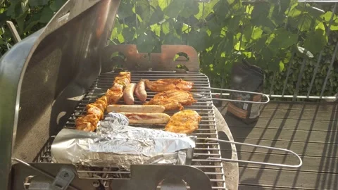 Barbeque grilling on Balcony 7 Stock Footage 202337782