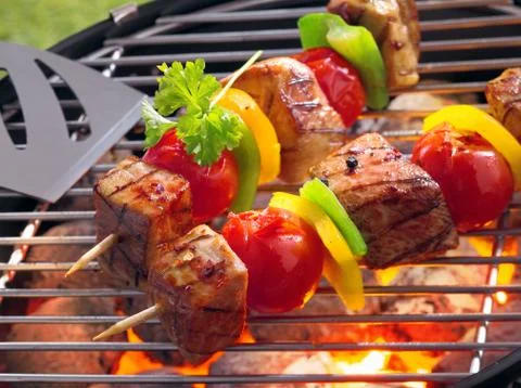 Barbeque with kebabs Stock Photos