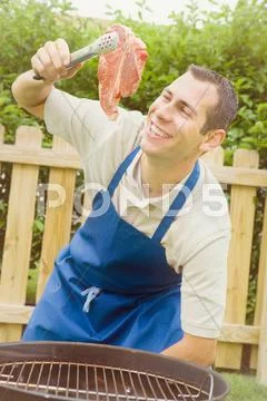Barbeque: man ready to cook steak Stock Photos