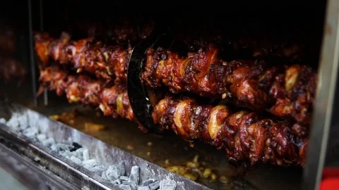 Barbeque meat spinning Stock Footage 113300446