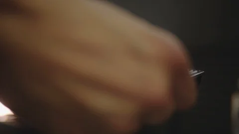 Barber cleans the trimmer for the next client. Care of tools for haircut Stock Footage 112606945