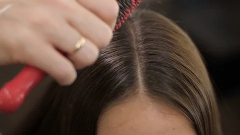Barber Combing Hair Stock Footage
