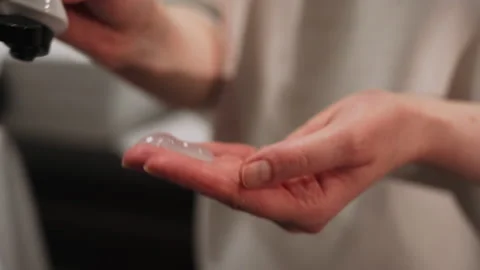 Barber cuts a man's beard with a typewriter in the salon Stock Footage 157621747