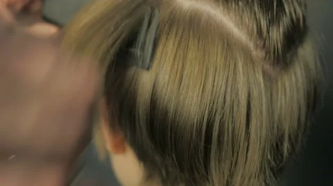 Barber doing a haircut with scissors Stock Footage 61101545