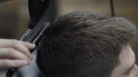 Barber dries hair Stock Footage 88158286