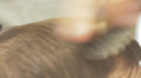 The Barber drying and brushing the head. Barbershop, 4k UHD Stock Footage 58491875