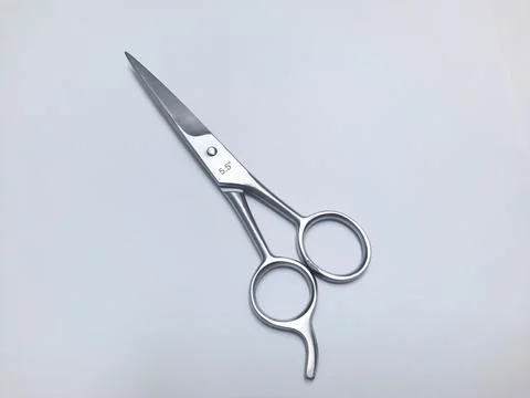 Barber hair scissors on white background Stock Photos