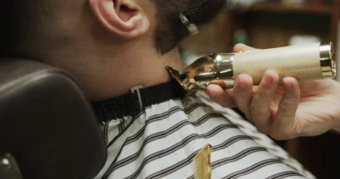 Barber makes hair styling Stock Footage 133186338