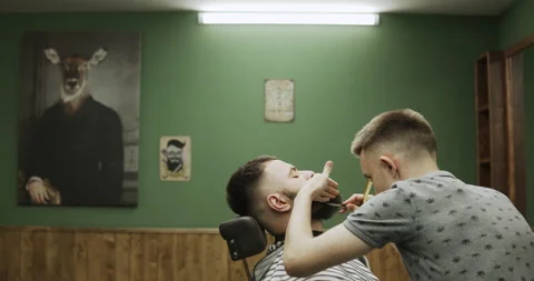 Barber makes hair styling Stock Footage 133187067