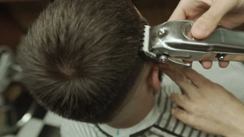 Barber makes hair styling Stock Footage 133187235