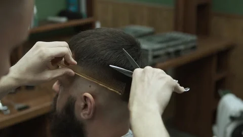 Barber makes hair styling Stock Footage 133187878