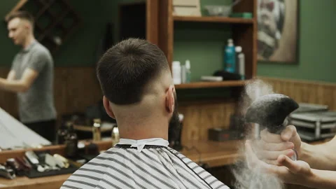 Barber makes hair styling Stock Footage 133188250