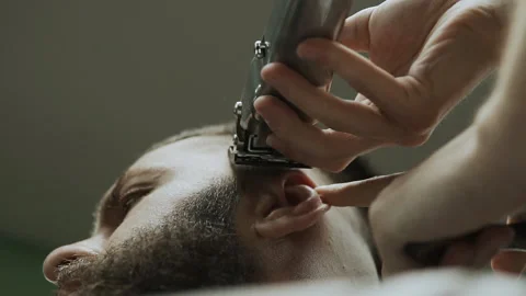 Barber makes hair styling Stock Footage 133188520
