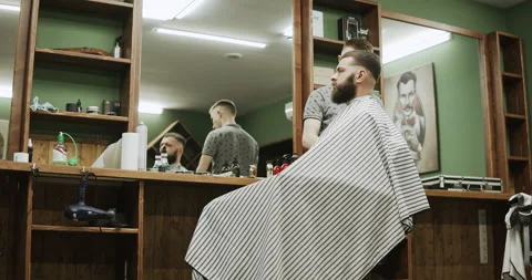Barber makes hair styling Stock Footage 133188740