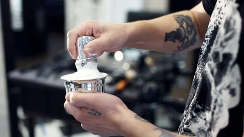 Barber makes shaving foam Stock Footage 71498469