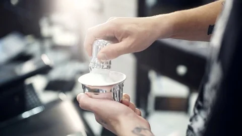 Barber makes shaving foam Stock Footage 71500767