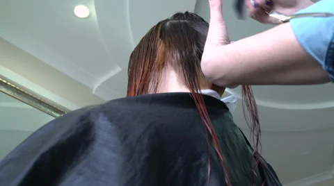 Barber makes a short cut Stock Footage 62296796